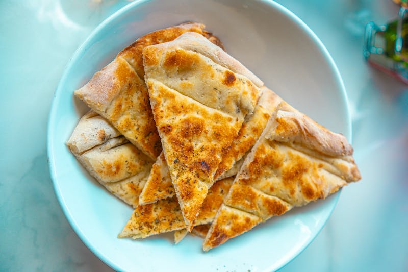 Garlic bread with herbs and butter appetizer